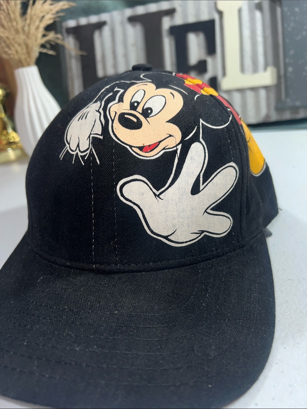 Vintage Disney Parks baseball cap features an embroidered Mickey Mouse SnapBack